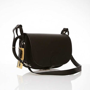 Black women's leather bag handcrafted from premium juchta leather with adjustable strap and secure flap closure