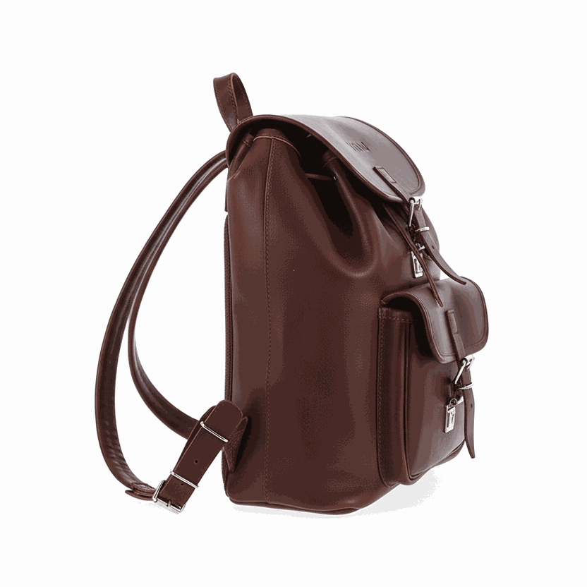 Large handmade leather backpack in brown with front pocket, padded straps, and vintage design.
