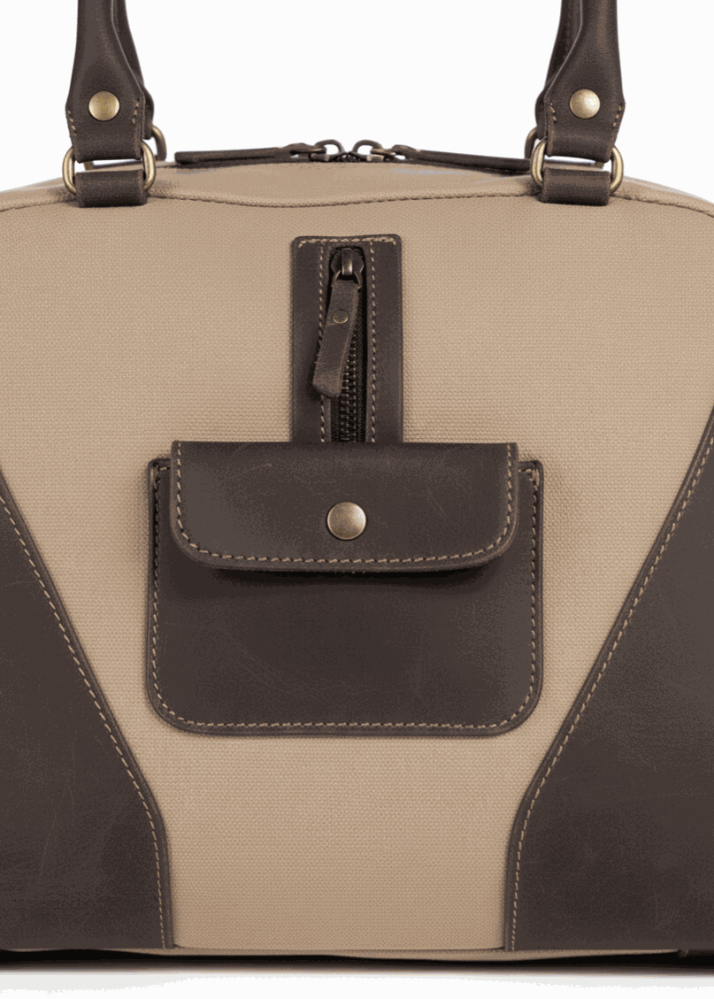 Tiara Canvas Shoulder Bag beige with dark leather accents and front pockets close-up