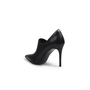 A black leather stiletto heel with a pointed toe and elastic upper detail, photographed on a white background.