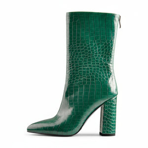 A black faux crocodile leather mid-calf boot with a pointed toe and block heel, photographed on a white background.