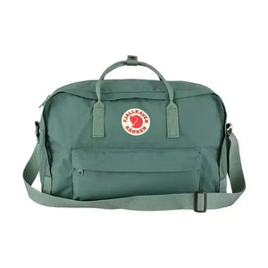 Green Fjällräven Kånken travel backpack – lightweight and waterproof