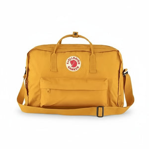 Model wearing yellow Fjällräven Kånken as backpack and shoulder bag