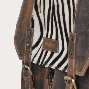 Handcrafted vintage brown leather backpack with brass buckles