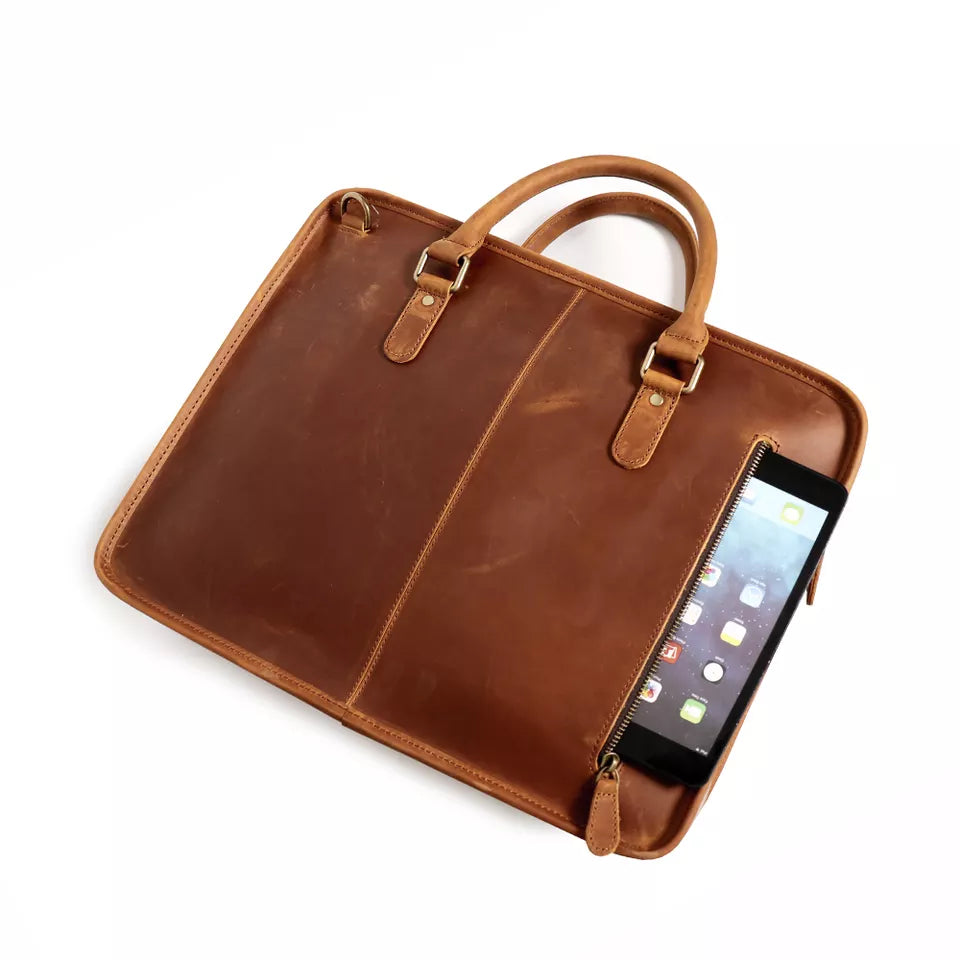 Full-grain leather laptop bag with brass hardware