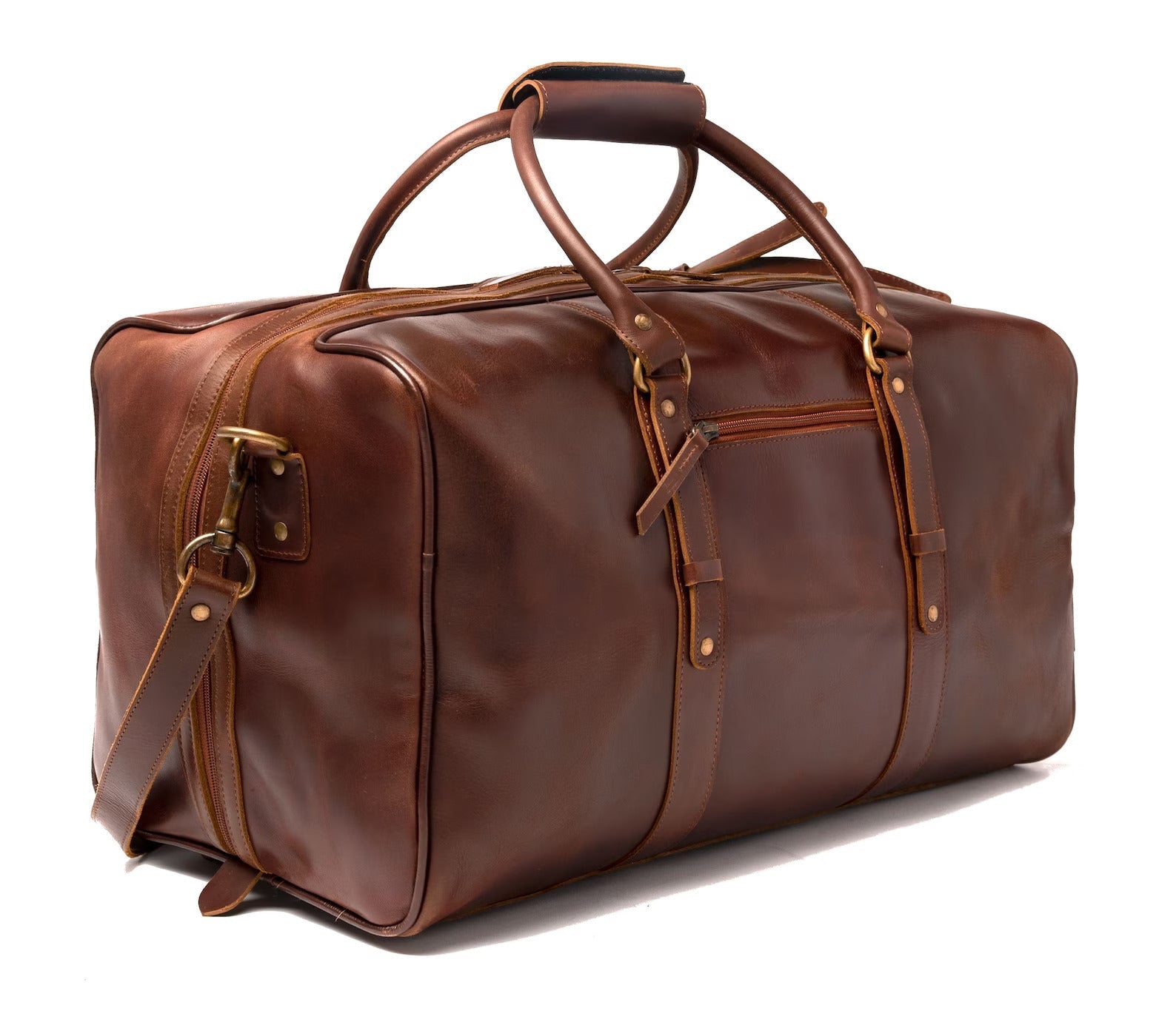 A 20-inch antique brown full-grain leather duffel bag with brass hardware, double handles, and detachable shoulder strap, photographed on a white background.