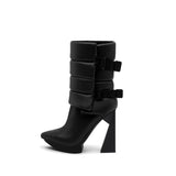 A black puffy vegan leather platform boot with adjustable straps and geometric high heel, photographed on a white background.