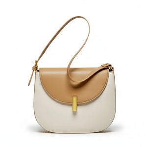 Discover the CherryMax Saddle Leather Crossbody Bag – crafted from premium cowhide leather with gold hardware and adjustable strap for timeless everyday elegance.